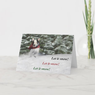 Bulldoggräddingvalp som rusar till och med snön helgkort