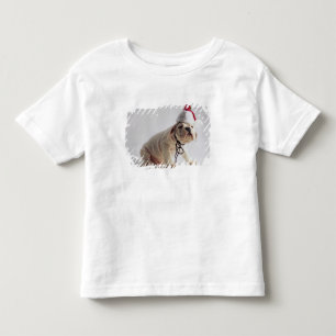 Bulldoggvalp som ha på sig den Santa hatten T-shirt