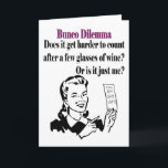 Bunco - Funny Dilema Helgkort<br><div class="desc">Den fina Bunco Dilema har en retro-stil-grafisk kvinna som har ett Bunco-poängkort. Hon frågar: "Blir det svårare att räkna efter några glas vin? Eller är det bara jag?" Underbar gåva till ge som Bunco-pris eller gåva. Underbar värdinna-gåva. Roligt Bunco Birthday, Bunco-jul, gör en underbar gag-gåva! Bunco Helgdag-gåvor. Anpassa med dina...</div>