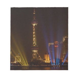 Bund (vattenfront) i Shanghai.Tittar Anteckningsblock