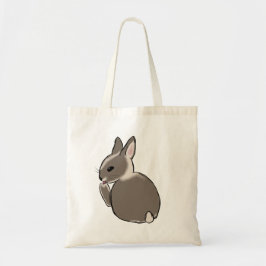 Bunny cleaning its paws  tygkasse
