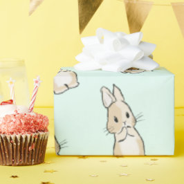 Bunny cleaning paws presentpapper