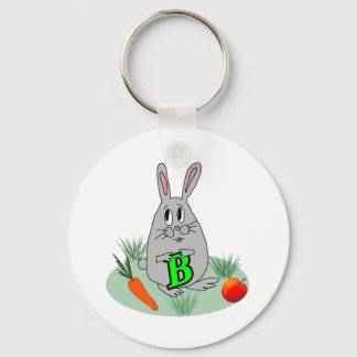 Bunny med brev B på gräsmatta Nyckelring