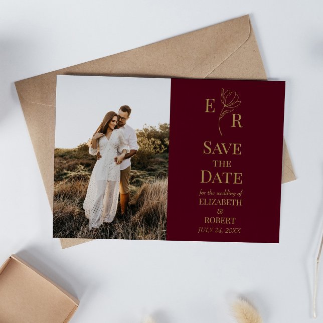 Burgunder Blommig Monogram Foto Spara Datum Kort (Burgundy Floral Monogram Photo Save the Date Invitation on neutral boho wedding table.)