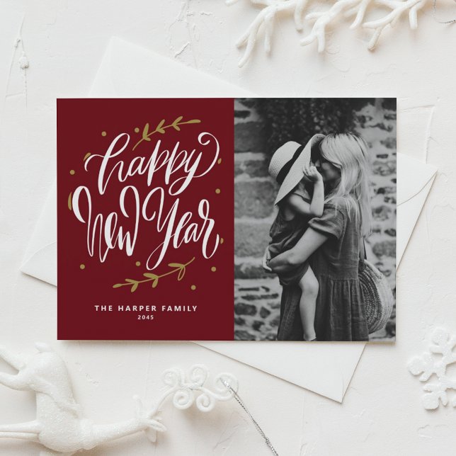 Burgunder kalligrafi och krans Nyår foto Julkort (Customizable burgundy photo Happy New Year card featuring modern calligraphy and wreath.)