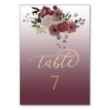 Burgundisk akvarellblomma med guld kalligrafi