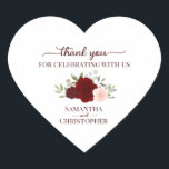 Burgundy Blush Roses Elegant Wedding Thank You Hjärtformat Klistermärke<br><div class="desc">These beautiful heart shaped thank you stickers are perfect as wedding favor tags or envelope seals. They feature a beautiful rustic boho chic design with your names and the wedding date with a lovely cluster of hand painted watercolor roses and foliage in shades of burgundy,  red,  and blush pink.</div>