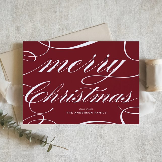 Burgundy Elegant Flourish Script Merry Christmas Julkort (This elegant Christmas card features a beautiful flourish script on a rich burgundy background.)