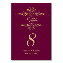 Burgundy elegant golden ram bröllop bord