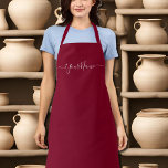 burgundy färg-elegant-skript<br><div class="desc">Burgundy färg (#800020 ) helsidigt färg-övertryckspron med band av samma färg. Den levereras med elegant-skriptet typsnitt.Enkel att anpassa det nu med ditt namn. Underbar för hobby eller affärsverksamhet. Du kan lägga till monogram/logotyp /text osv. Designer's Tip : namn kommer i elegant-handskript med dekortecken. När du anpassar det placerar du ditt...</div>