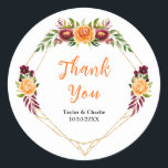 Burgundy Orange Floral Wedding Thank You Runt Klistermärke<br><div class="desc">This beautiful and elegant wedding thank you sticker features watercolor burgundy red and orange flowers with foliage on a gold geometric frame. The text combines handwritten script and serif fonts for a stylish and modern look. This is perfect for an autumn fall rustic wedding.</div>