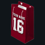 Burgundy Sporty Team Jersey<br><div class="desc">Burgundy Team Jersey/Sports Jersey/Football Jersey Anpassa detta med ditt eget namn eller lag namn och ett nummer. Du kan ändra textens storleka placering, färg och placering om du behöver göra ändringar, ta bort textskuggan, lägga till egen text och/eller bilder för att skapa din egen unika design med mera. FantabulousSports/Fantabulous Sports...</div>