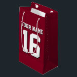 Burgundy Sporty Team Jersey<br><div class="desc">Burgundy Team Jersey/Sports Jersey/Football Jersey Anpassa detta med ditt eget namn eller lag namn och ett nummer. Du kan ändra textens storleka placering, färg och placering om du behöver göra ändringar, ta bort textskuggan, lägga till egen text och/eller bilder för att skapa din egen unika design med mera. FantabulousSports/Fantabulous Sports...</div>