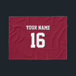 Burgundy Sporty Team Jersey Fleecefilt<br><div class="desc">Burgundy Team Jersey/Sports Jersey/Football Jersey Anpassa detta med ditt eget namn eller lag namn och ett nummer. Du kan ändra textens storleka placering, färg och placering om du behöver göra ändringar, ta bort textskuggan, lägga till egen text och/eller bilder för att skapa din egen unika design med mera. FantabulousSports/Fantabulous Sports...</div>