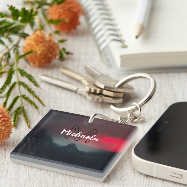 Burning clouds, fog and mountains monogram in sky (Högra Framsidan)