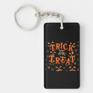 Bus eller godis Halloween-akryliska nyckelkedjor