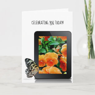 butterfly on electronic tablet device with pansy kort