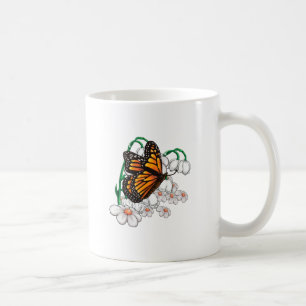 Butterfly på blommor kaffemugg