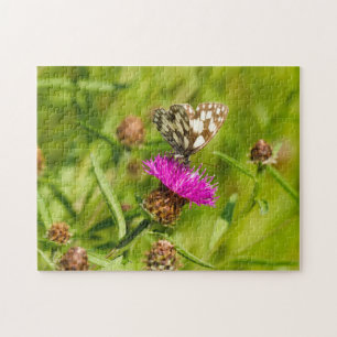 Butterfly på Thistle Jigszle Puzzle Pussel