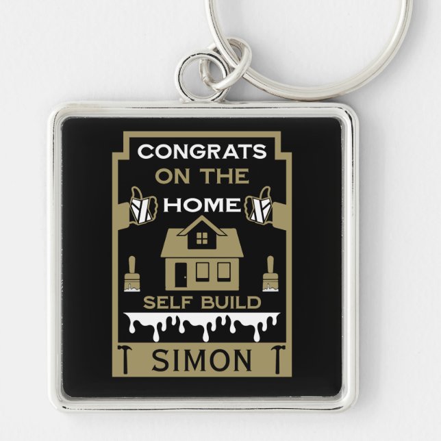 Bygg Grattis hemma Fyrkantig Silverfärgad Nyckelring (Framsidan)