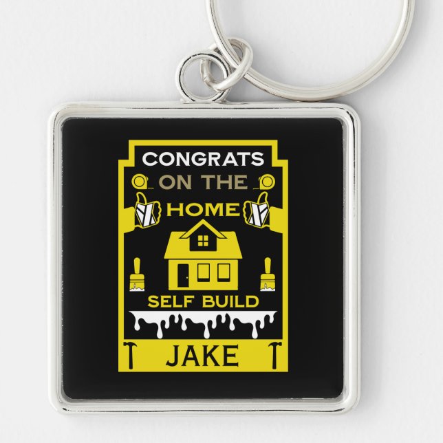 Bygg Grattis hemma Fyrkantig Silverfärgad Nyckelring (Framsidan)