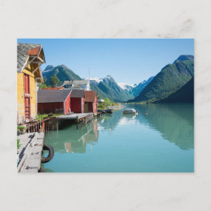 Byn Fjæ rland och en fjord i vykort för Norge