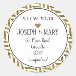 Byte av modern herringben i adress svart guld runt klistermärke