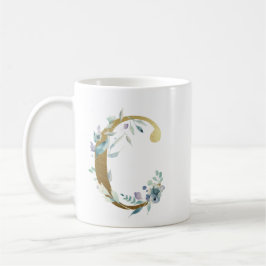 C guld initial med blå blommigt folie kaffemugg