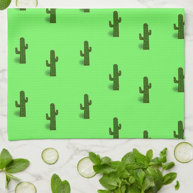 Cactus fabrik på ljust grönt kökshandduk (Vikta)