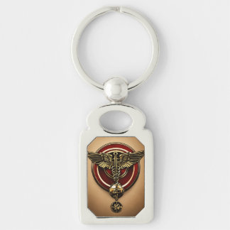 Caduceus, bästa sak för att ge medicin. rektangulärt silverfärgad nyckelring