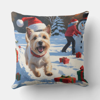 Cairn Terrier springer i snö med julhatt Kudde