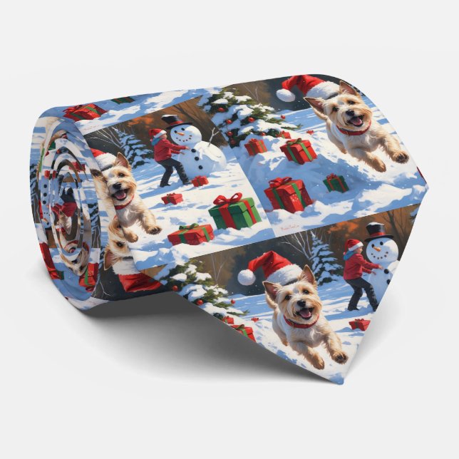 Cairn Terrier springer i snö med julhatt Slips (Rullad)