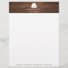 Cake Monogram Logotyp in White on Brown Woodgrain Brevhuvud