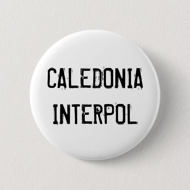 Caledonia Interpol knäppas Knapp (Framsida)