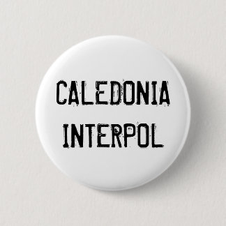 Caledonia Interpol knäppas Knapp
