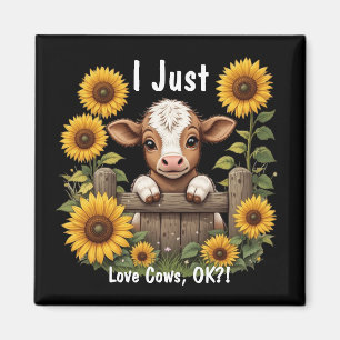 Calf söker över stängsel omgiven av solblommor magnet