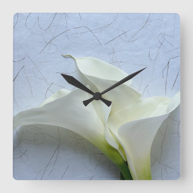 Calla lilies på dekorativ bakgrund fyrkantig klocka (Framsida)