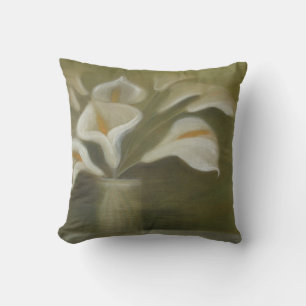 Calla skär blommor i ett konstnärligt stillliv i V Kudde