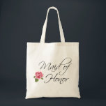 Calligrafi i maid of honor och Ro Tygkasse<br><div class="desc">En blomstrande kalligrafi för Maid of honor och förskönad med rosa ros. Denna punkt är ett underbart val som bröllopsförmån för brudens sida under evenemang och aktiviteter kring bröllop.</div>