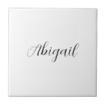 Calligraphy Elegant Black White Plain Simple Namn Kakelplatta<br><div class="desc">Tittar du för en vacker kalligrafi med en estetisk handstil? Den här enkla,  öga-fångstdesignen är till för dig. Den här produkten imponerar omedelbart på dem som ser den. Bran och den smakfulla utformningen återspeglar omedelbart kvaliteten på ditt förhållande och din familj.</div>