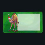 Camel jul på Grönt Fraktsedel<br><div class="desc">Julgåvor och tillbehör från djurlägret Parad i julklapp har vårt roligt av en söt brun kamel som är utsliten i en julthatt som står i ett snöslandskap mot en texturerad mörk blått stjärnkväll himlar digitalt målad av våra begåvade barns illustratör, Traci Van Wagoner. På baksidan av många av de här...</div>