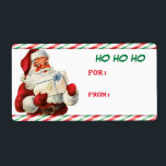 Candy cane Jultomten Gift Märkre-etikett Fraktsedel<br><div class="desc">Den här presentetiketten från paket är vintage bild på en klassisk jultomte som har en gåva från paket. Bilden gränsar uppåt och grund med söt röd,  grönt och vit candy cane rand mönster. Grönten säger "HO HO HO" på den översta högerna,  och texten i anpassningsbarna är röd under den.</div>