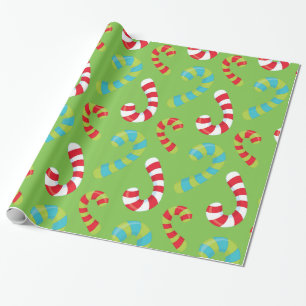 Candy cane på den gröna helgdag som slår in pap presentpapper