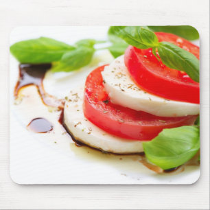 Caprese sallad. Tomat- och Mozzarellaskivor Musmatta