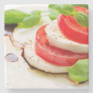 Caprese sallad. Tomat- och Mozzarellaskivor Stenunderlägg