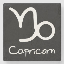 Capricorn Zodiac-tecken på svart bakgrund Stenunderlägg