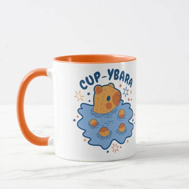 CAPYBARA PUDDLE PUN CAP-YBARA MUGG (Vänster)