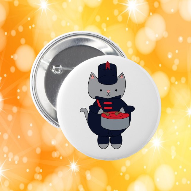 Cat Drummer Marching Band Navy Blue Red Knapp (A pin featuring a gray cat playing drums in a navy blue & red marching band uniform.)