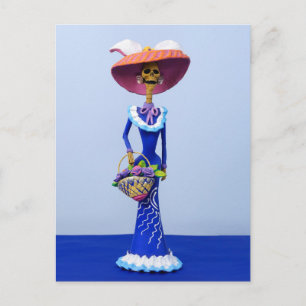 Catrina i en blå klänning och rosa hatt vykort