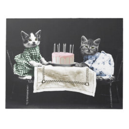 Cats celebrating a birthday with cake and candles anteckningsblock